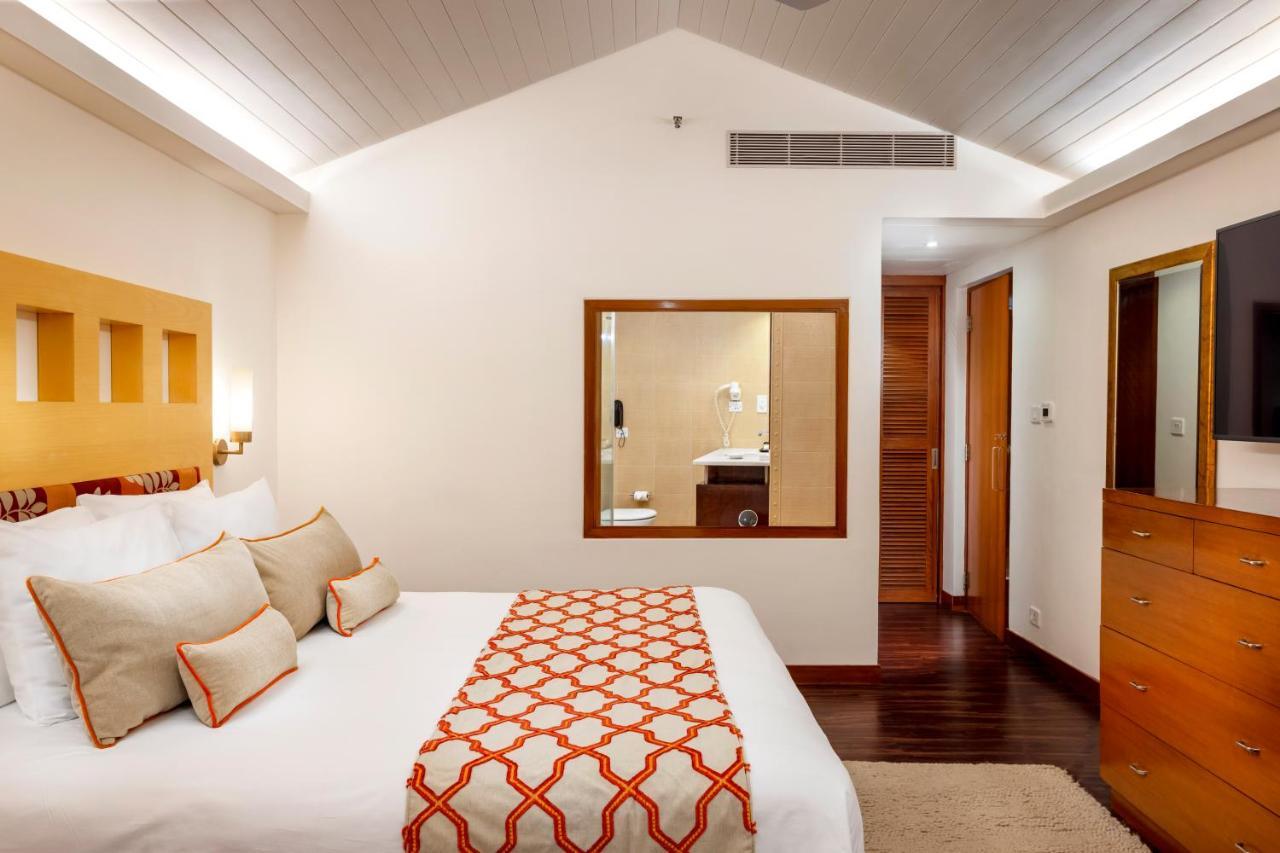 Caravela Beach Resort Varca Bagian luar foto A bedroom at the Taj Bengal