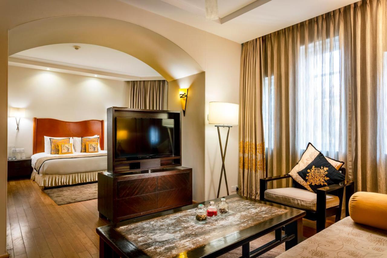 Caravela Beach Resort Varca Bagian luar foto A suite at the hotel