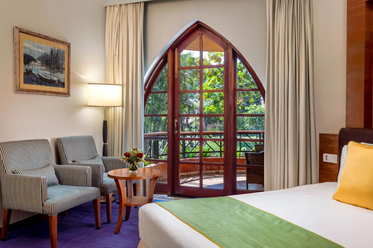 Caravela Beach Resort Varca Bagian luar foto A room at the hotel