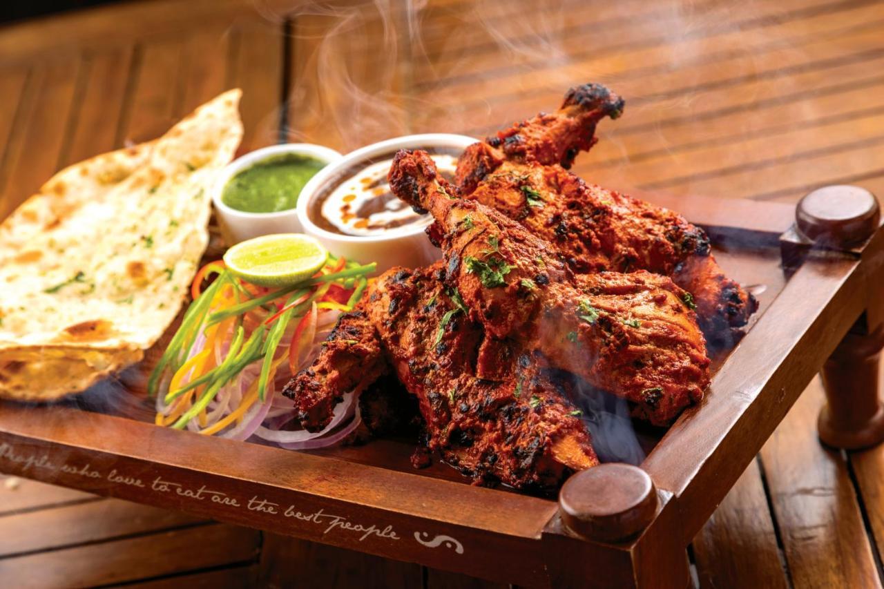 Caravela Beach Resort Varca Bagian luar foto Tandoori Chicken