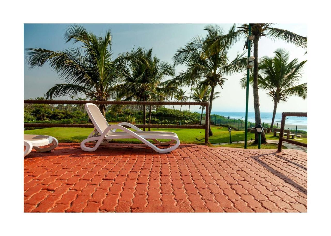Caravela Beach Resort Varca Bagian luar foto A view of the beach at the resort